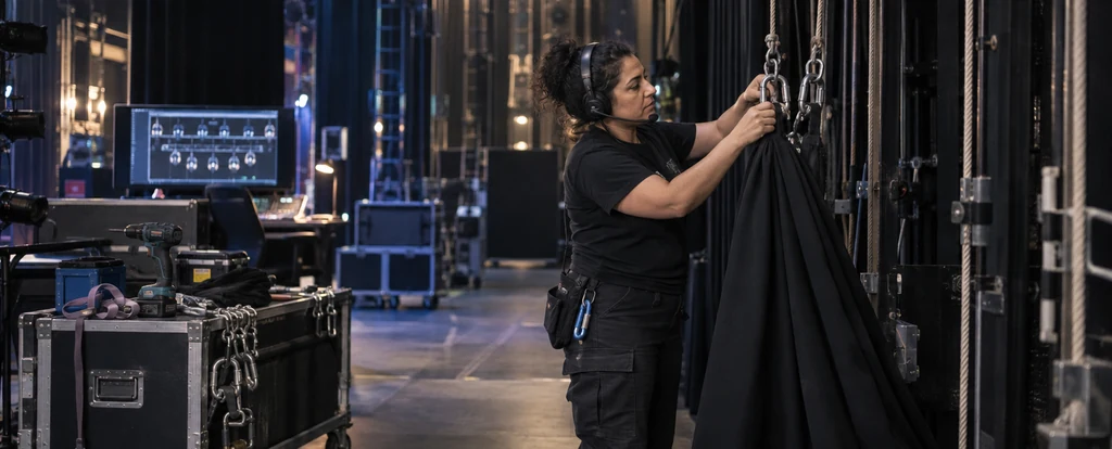 Illustration of a person working as a stagehand